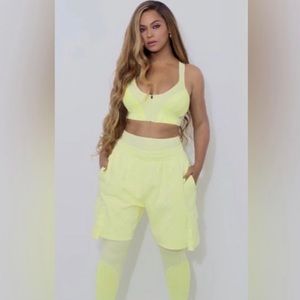 Adidas x IVY PARK zip up bralette in yellow tint